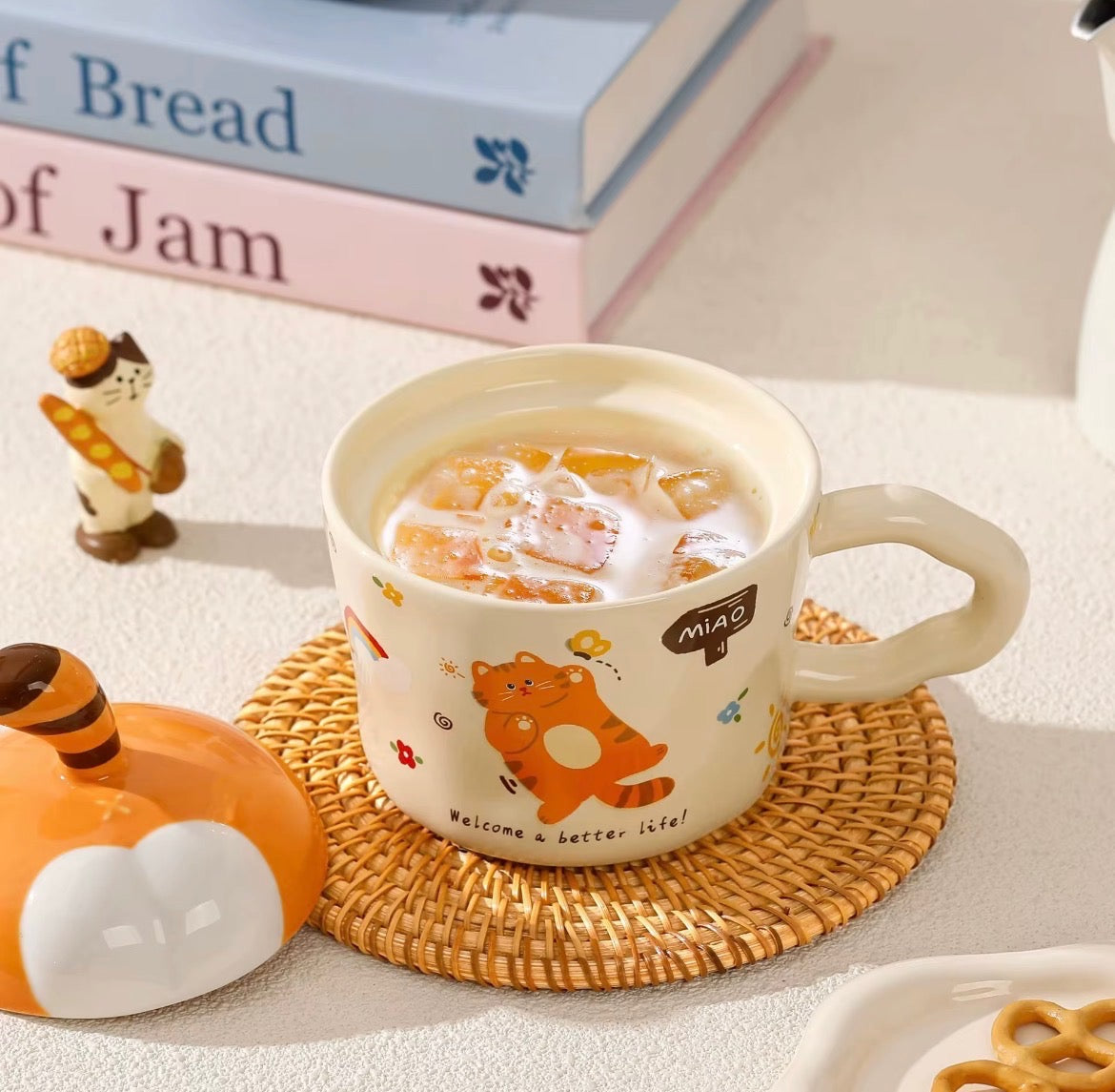 Kopp med lock med kattmotiv i keramik