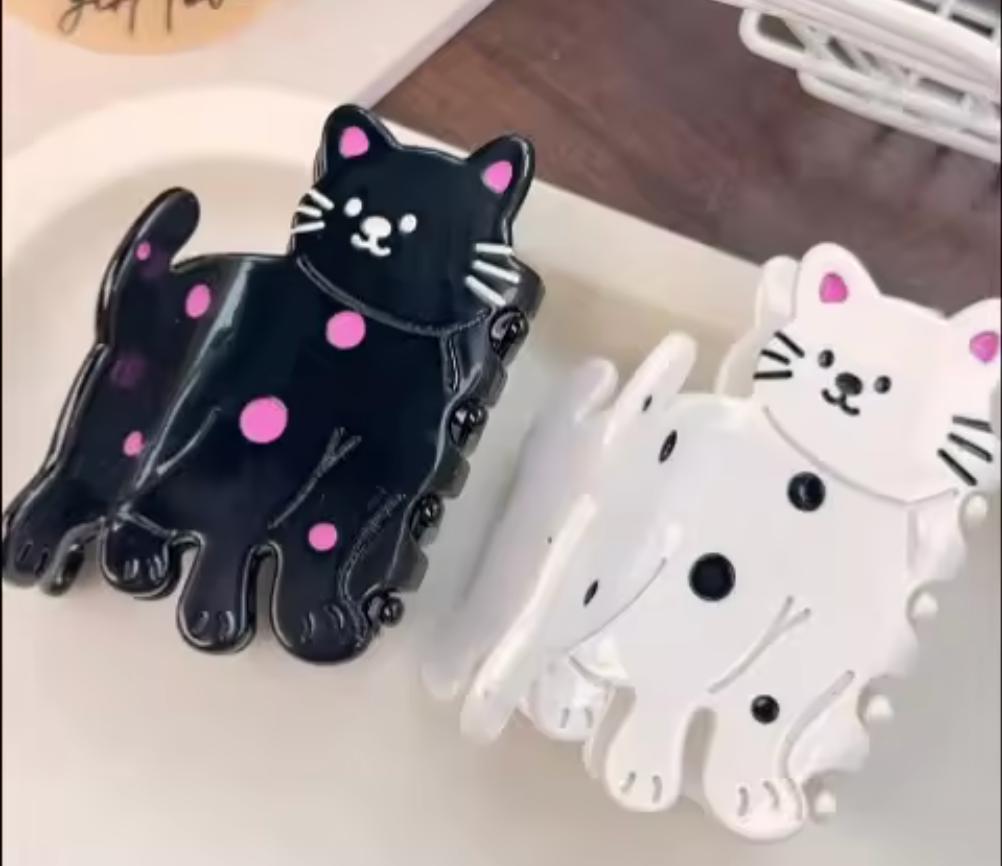 Hårklämma- prickig katt