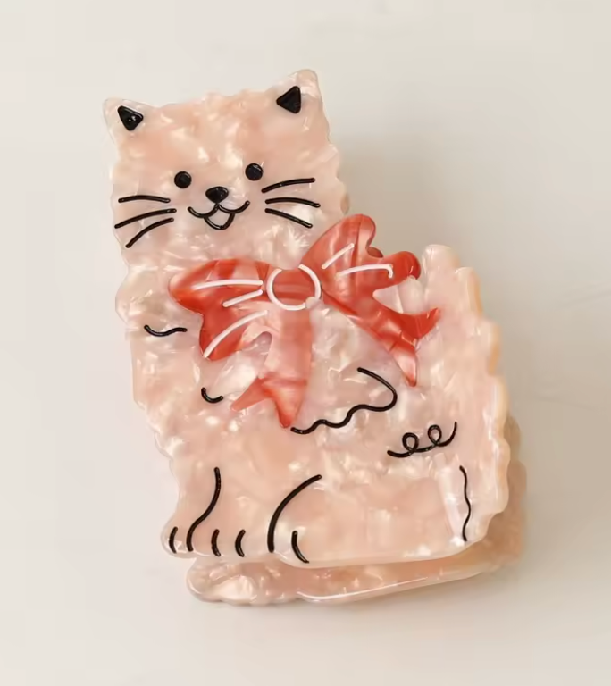 Hårklämma-katt med rosett, finns i två färger