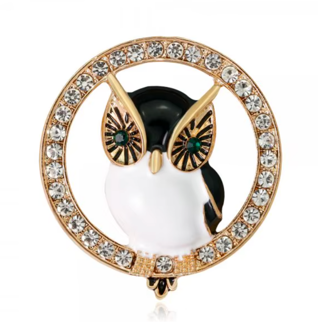 Brosch-uggla i ring
