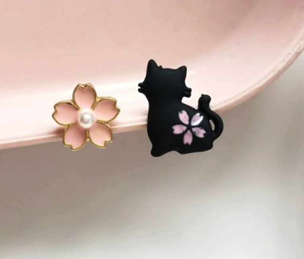 Örhängen-Katt och blomma