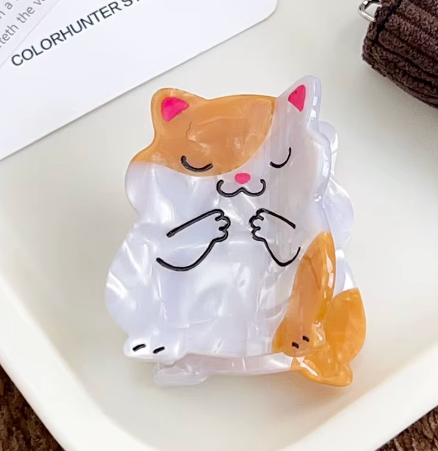 Hårklämma-finns som ekorre och som katt