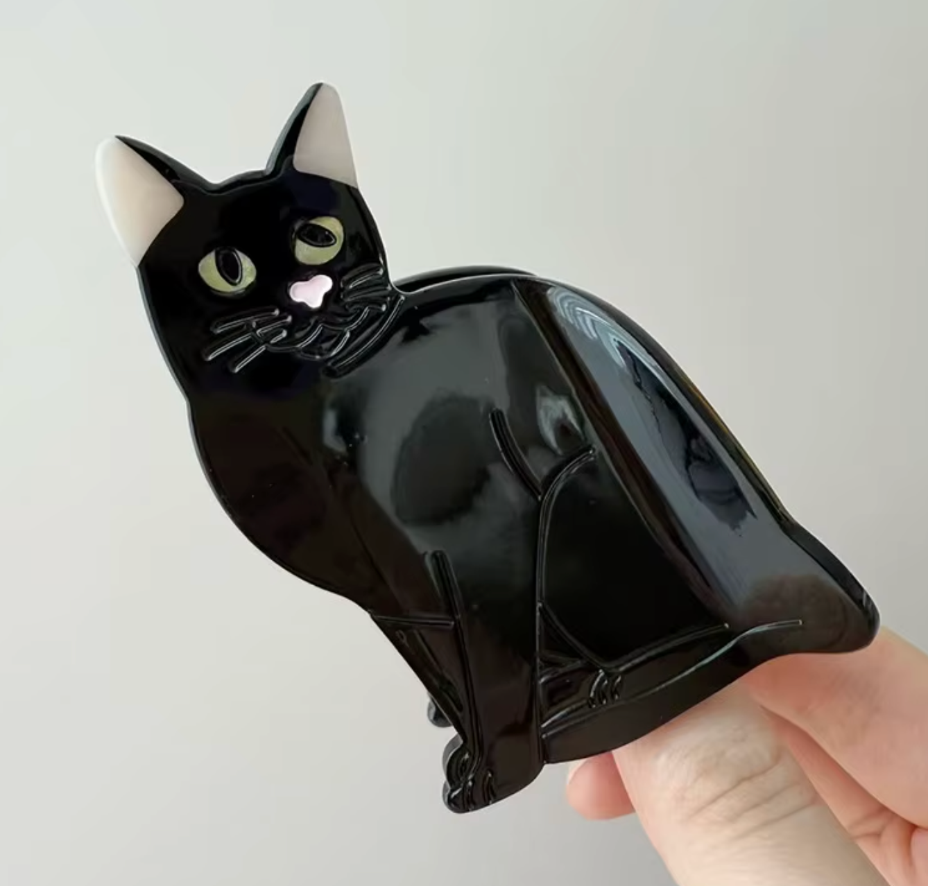 Hårklämma-sittande katt, finns i 4 olika varianter