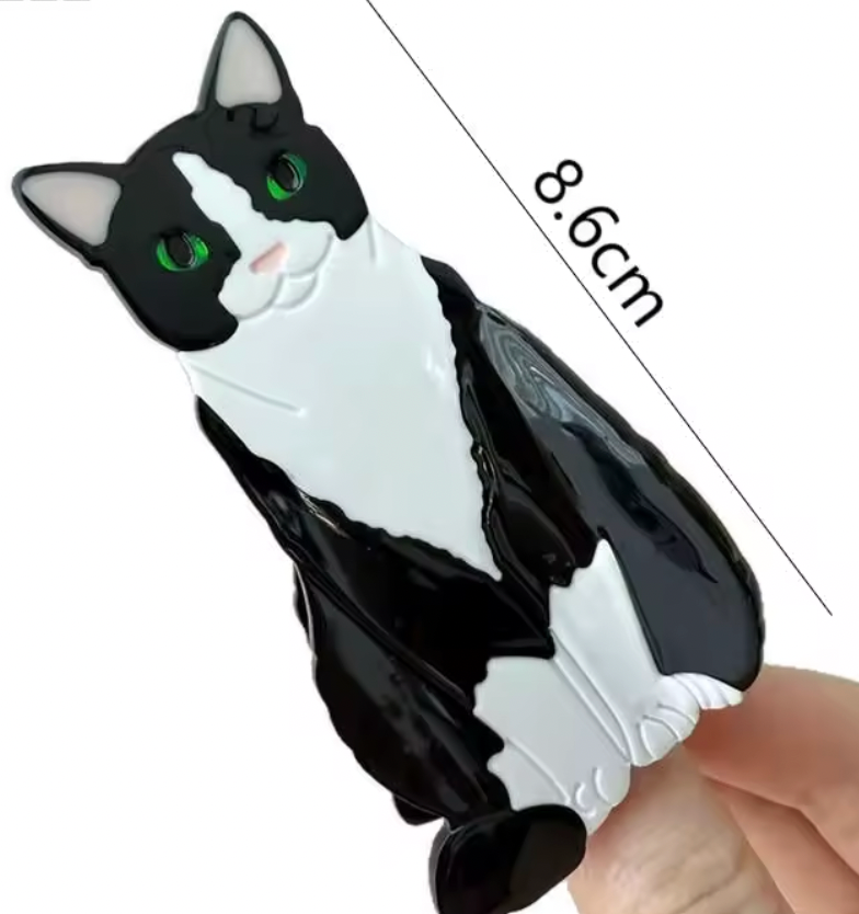 Hårklämma-sittande katt, finns i 4 olika varianter