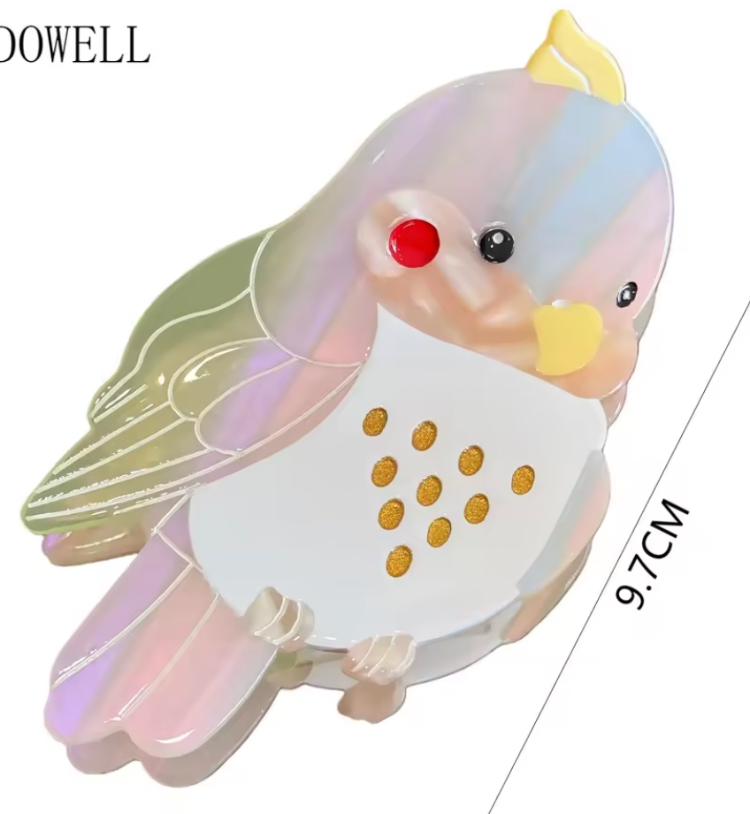 Hårklämma-kakadua, finns i blå och i vit