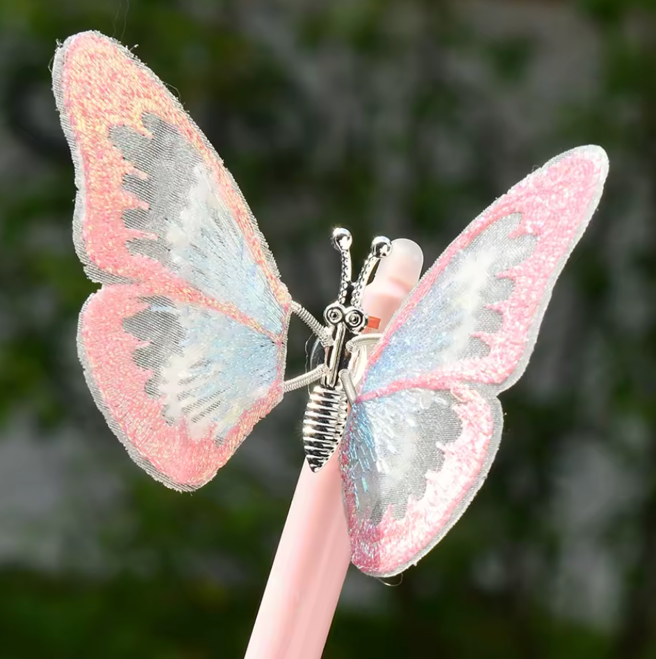 Fjärilspenna med suddbart bläck, finns i rosa och ljusblå