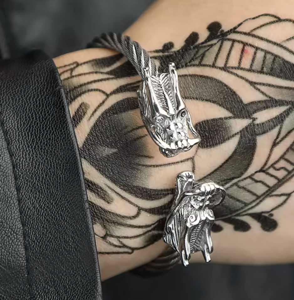 Armband-drake, finns i guld och i silverfärg
