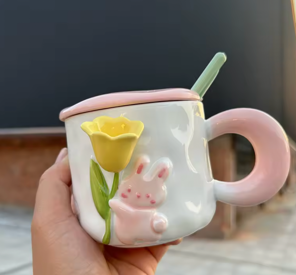 Kopp -kanin med blomma, finns i rosa och ljusblå