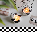 Presentlåda med keramikpanda och medföljande doftljus